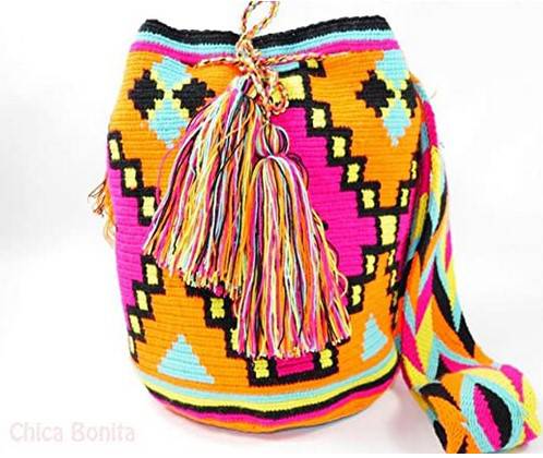 Luxury Holiday shoulder bag beautiful for any occasion (Chica Bonita) Modeled by Shakira