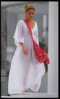 Wayuu Luxury Holiday shoulder bag beautiful for any occasion (Sunset Flame) Modeled by Shakira - nappyworlduk