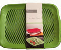 Multi chopping cutting board with strainer in green for easy washing and preparing food robust and durable design