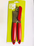Manual tin opener with red ergonomic handles on yellow packaging labeled "Twist Me Can Opener"