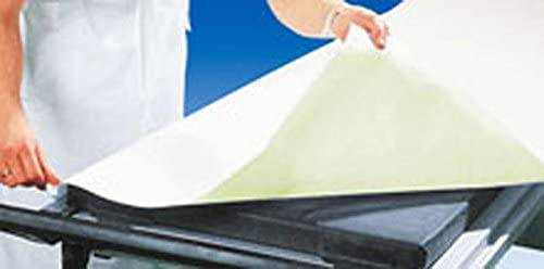 Vala protect disposable bed sheet being placed on a medical bed with waterproof backing and absorbent tissue features