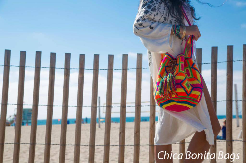 Wayuu Luxury Holiday shoulder bag beautiful for any occasion (Sunset Flame) Modeled by Shakira - nappyworlduk
